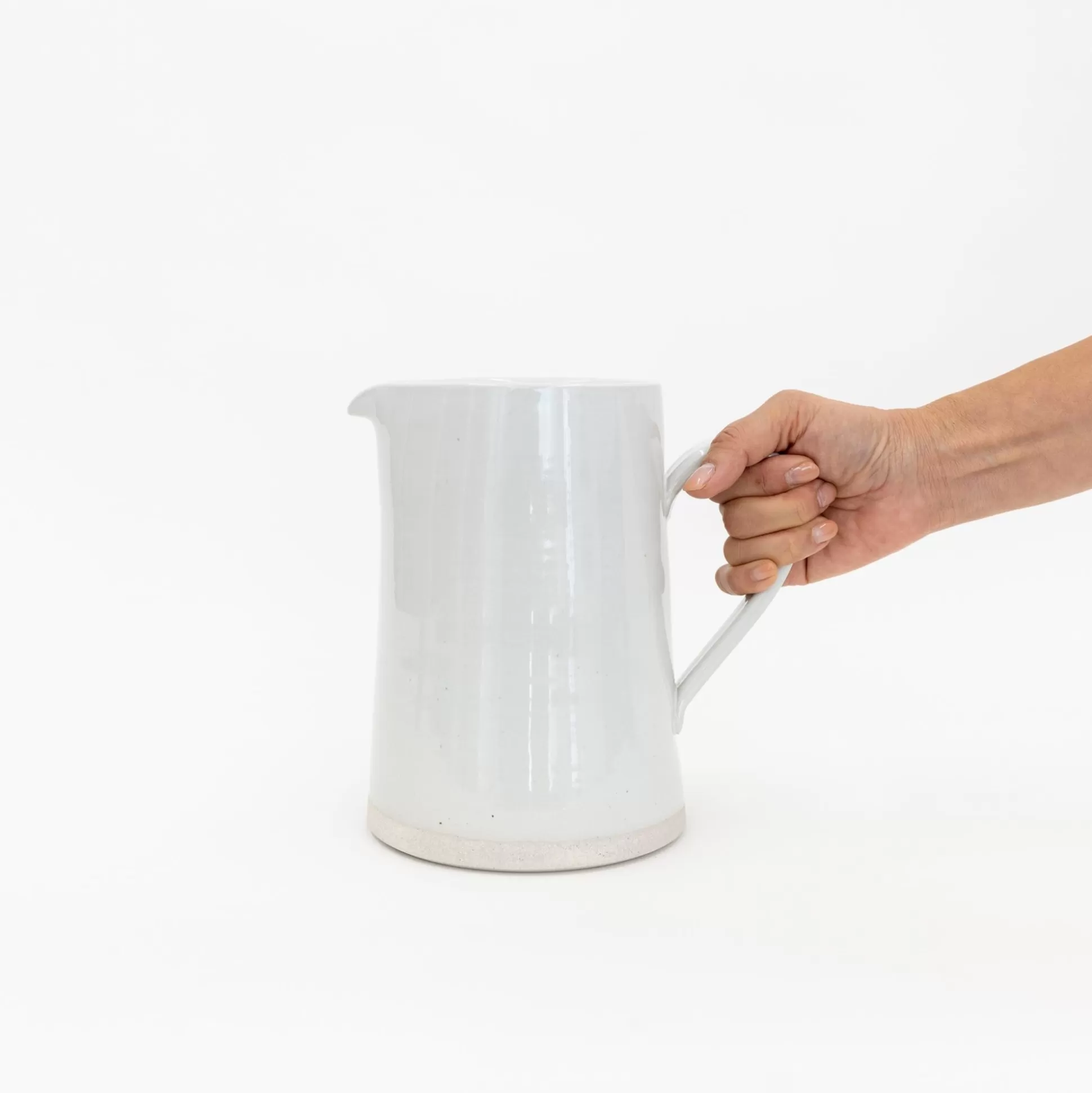 Store Pitchers — White Storing